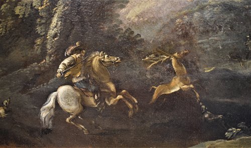 Deer hunting in forest landscape